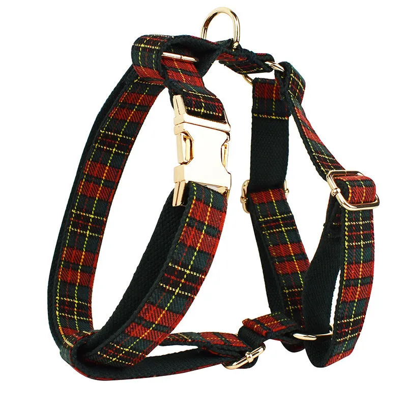 Christmas plaid green dog collar set with leash bow and vest on a festive background