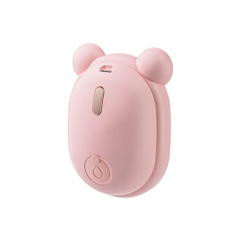 Rechargeable pet grooming brush with steam spray function in pink or yellow colour options