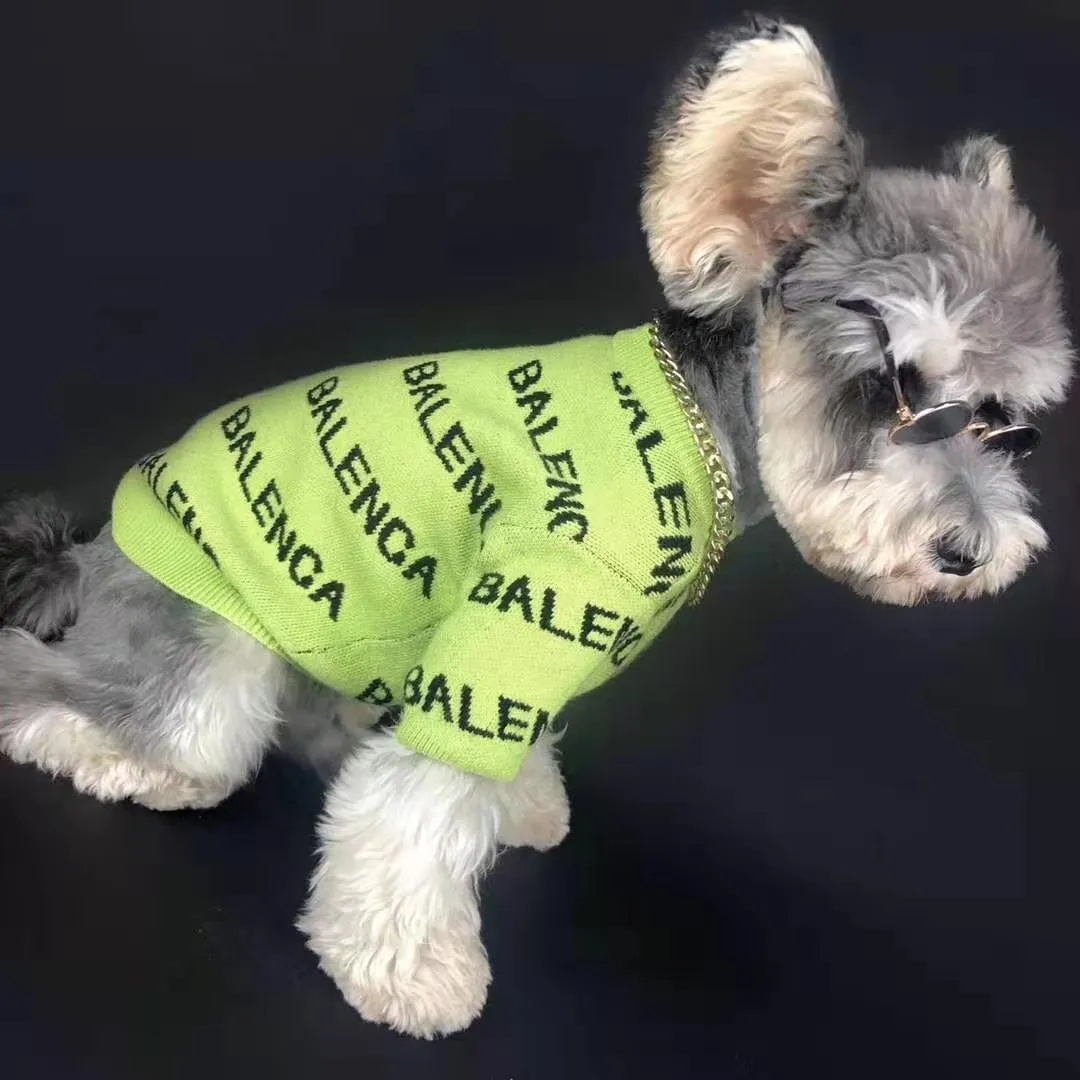 Black acrylic knit dog pullover sweater for small to large dogs, shown on a Schnauzer