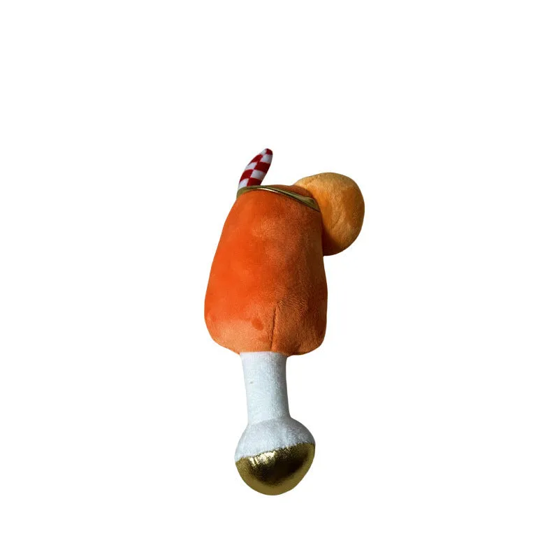 Yellow wine glass shaped plush squeaky dog chew toy showing scale.