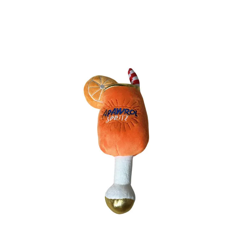 Yellow wine glass shaped plush squeaky dog chew toy showing scale.