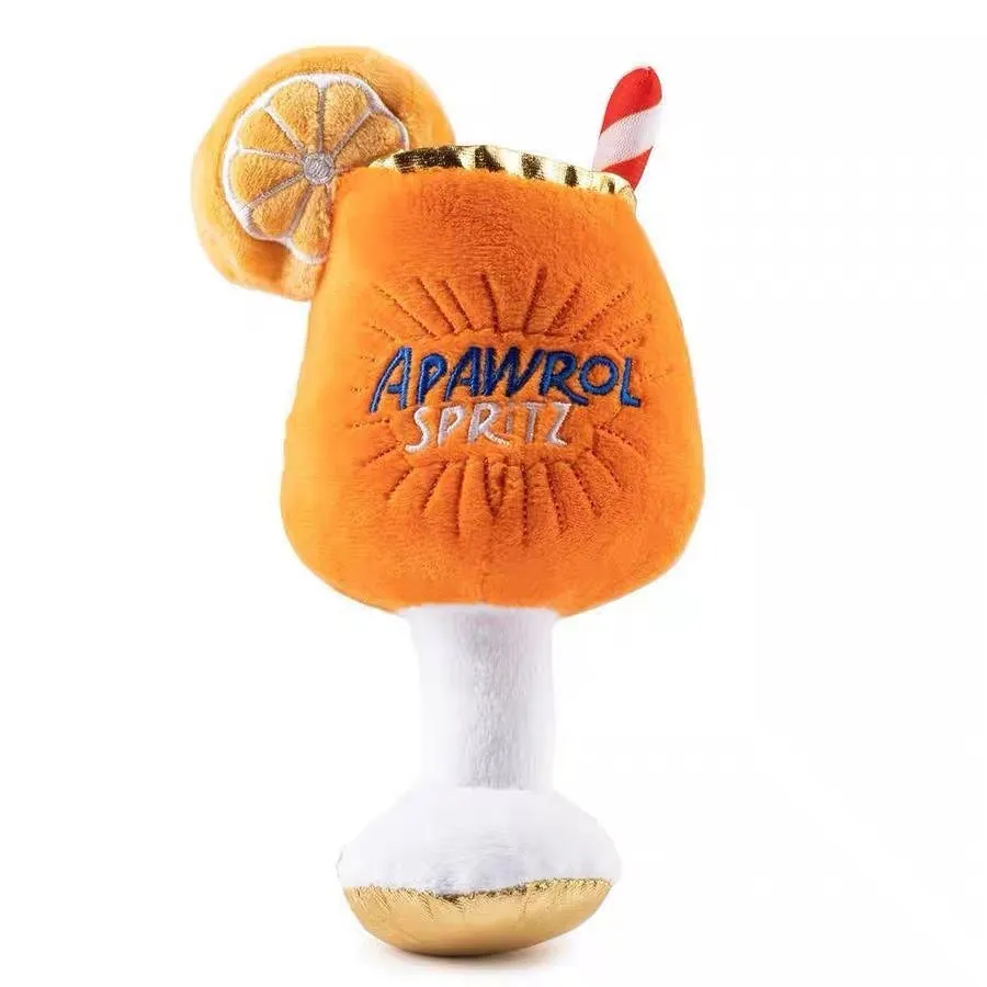 Yellow wine glass shaped plush squeaky dog chew toy showing scale.