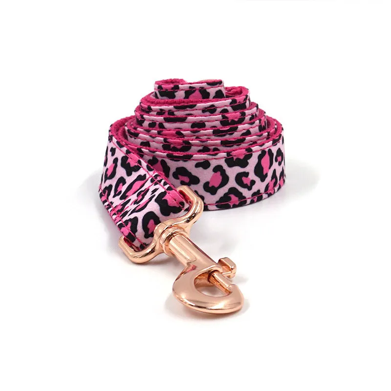 Leopard print rose gold dog collar and leash set on a white background, showing collar and attached leash