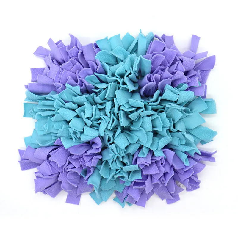 Plush dog sniffing pad with blue and yellow bud pattern on non-slip base