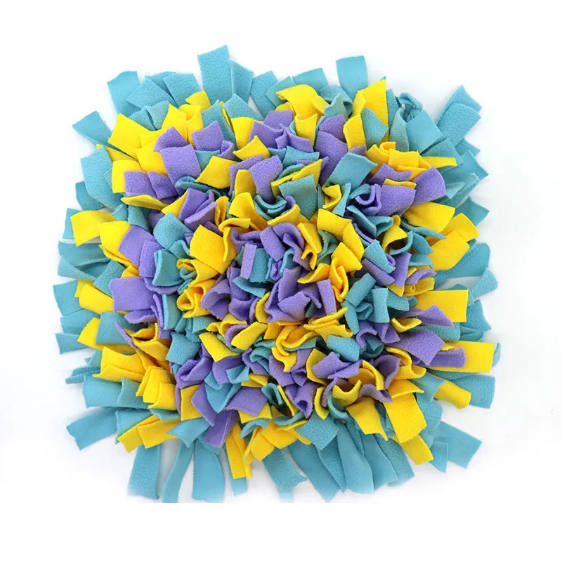 Plush dog sniffing pad with blue and yellow bud pattern on non-slip base