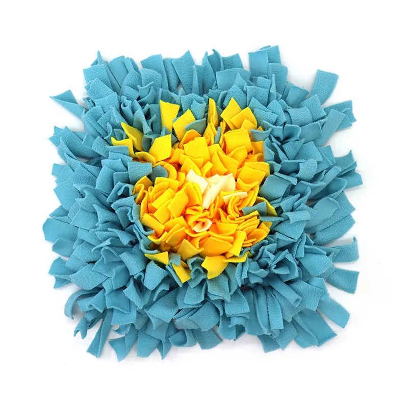 Plush dog sniffing pad with blue and yellow bud pattern on non-slip base