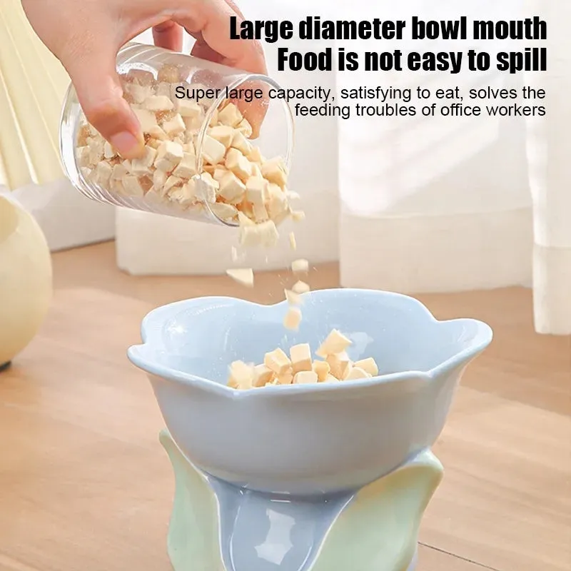 Blue ceramic raised pet bowl with floral pattern and non-slip base for cats and small dogs