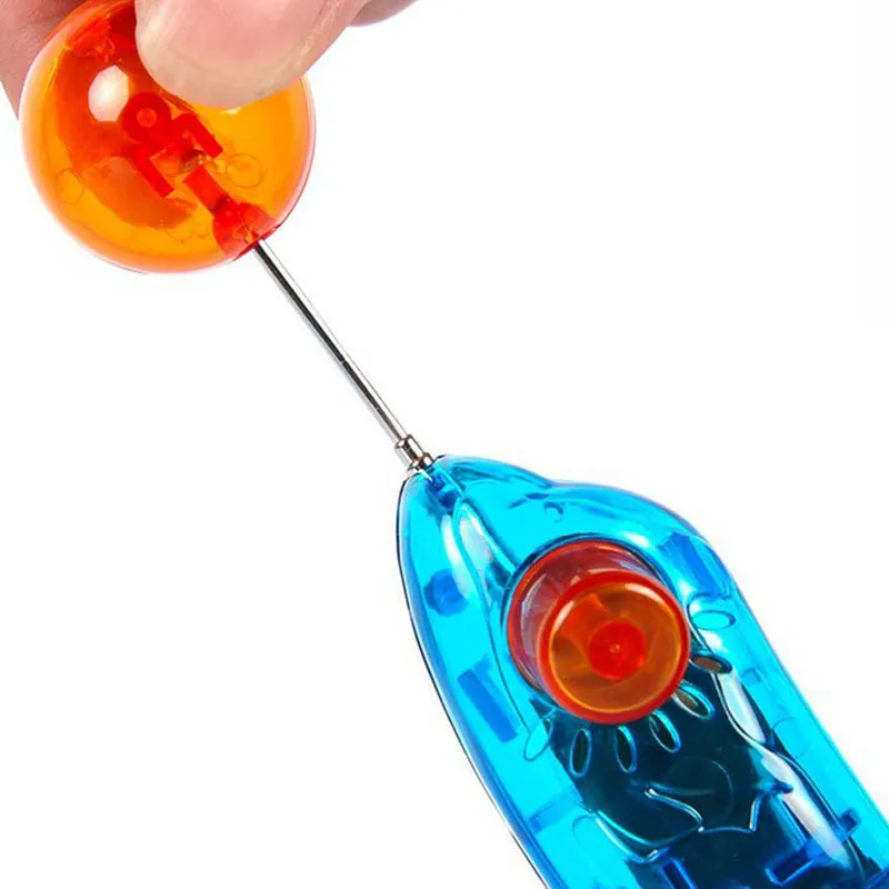 Blue plastic dog training clicker on white background