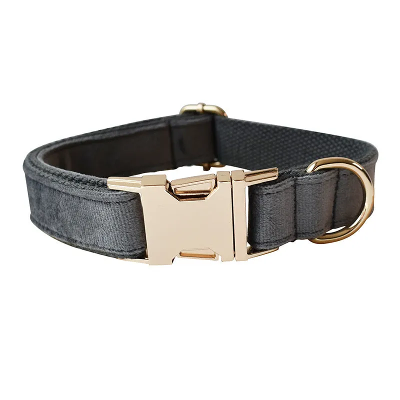 Silver grey polyester dog leash and collar set with alloy carabiner and bow detail on wooden floor