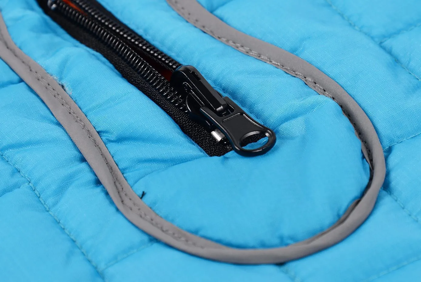 Waterproof reflective dog jacket in red, blue, and purple on a white background, polyester material, five sizes