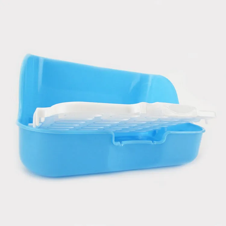 Large rectangular rabbit toilet in blue, measuring 30cm by 22cm by 16cm, with a shovel and garbage bag beside it on a surface