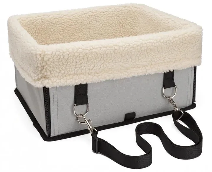 Foldable pet car seat bag in beige with lambswool lining and Oxford cloth exterior on car seat
