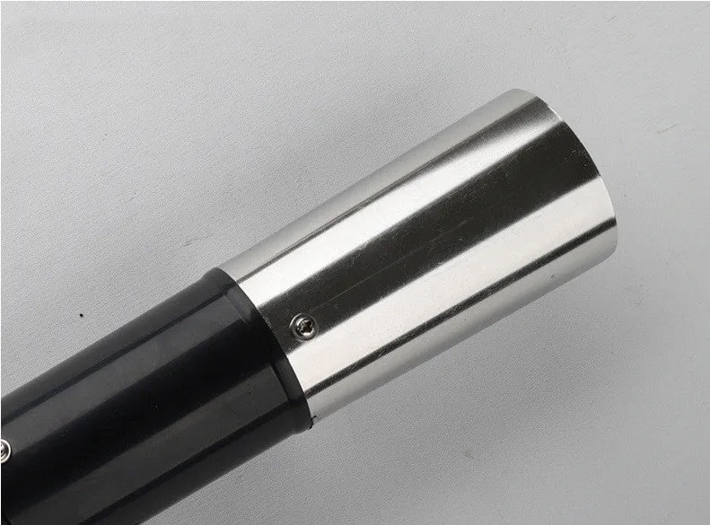 Black electric fish scale scraper with plastic shell and alloy parts, 7000 r/min descaling tool on a table