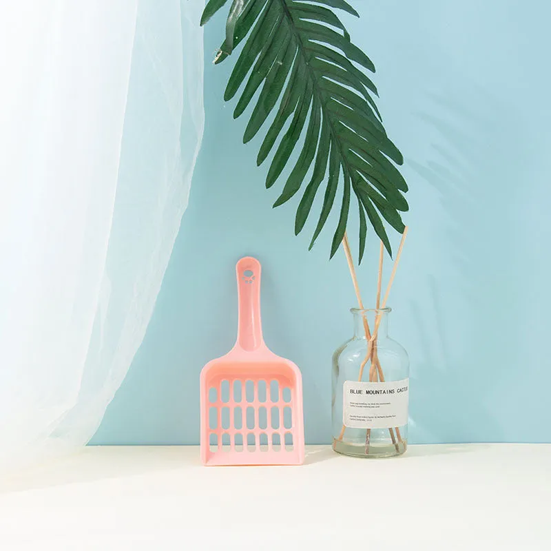 Plastic cat litter shovel in pink, 19.5x8x2.5cm, for small cleaning tasks