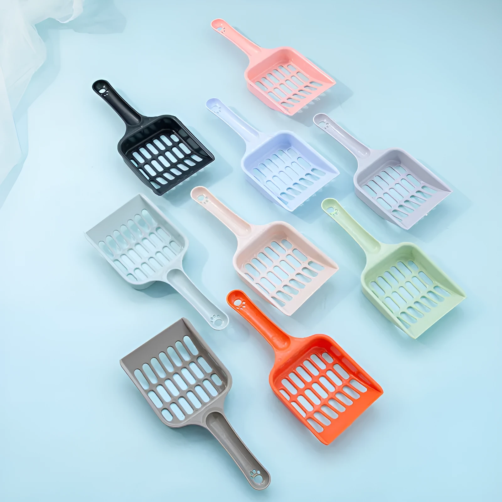 Plastic cat litter shovel in pink, 19.5x8x2.5cm, for small cleaning tasks