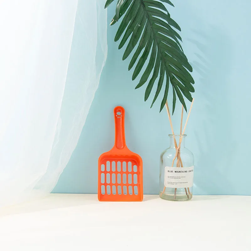 Plastic cat litter shovel in pink, 19.5x8x2.5cm, for small cleaning tasks