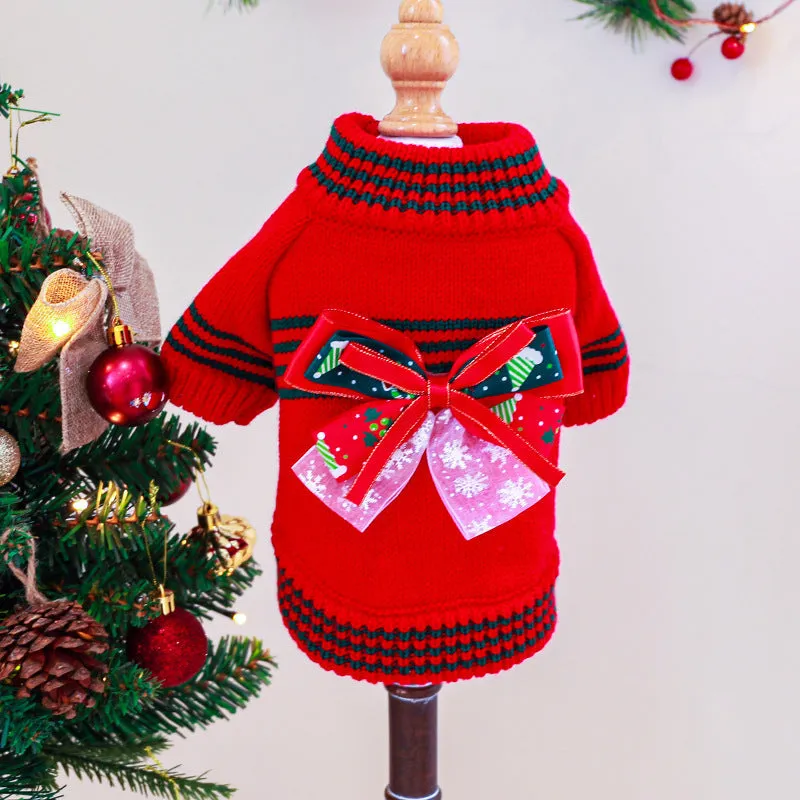 Red 'Merry Christmas' knitted jumper on a small dog, showing festive pattern and full-body fit.