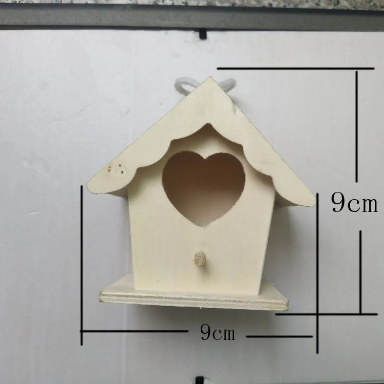 Set of six polished wooden bird nest ornaments in pine and poplar, including heart, double hole, and lace eave styles.