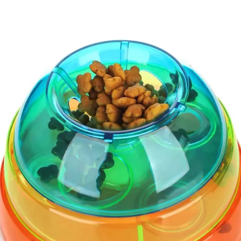 Dog leak food toy ball in photo colour, non-slip base, 12.5cm bottom diameter, on a plain background