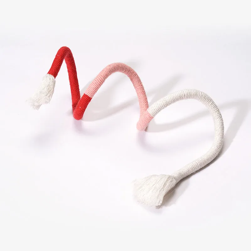 Solid colour cotton thread cat toy bite rope with catnip in purple, orange, pink, or green