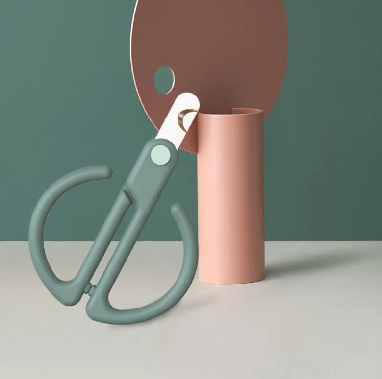 Grey cat nail clippers with ABS handle and 3CR13 blade on a light background