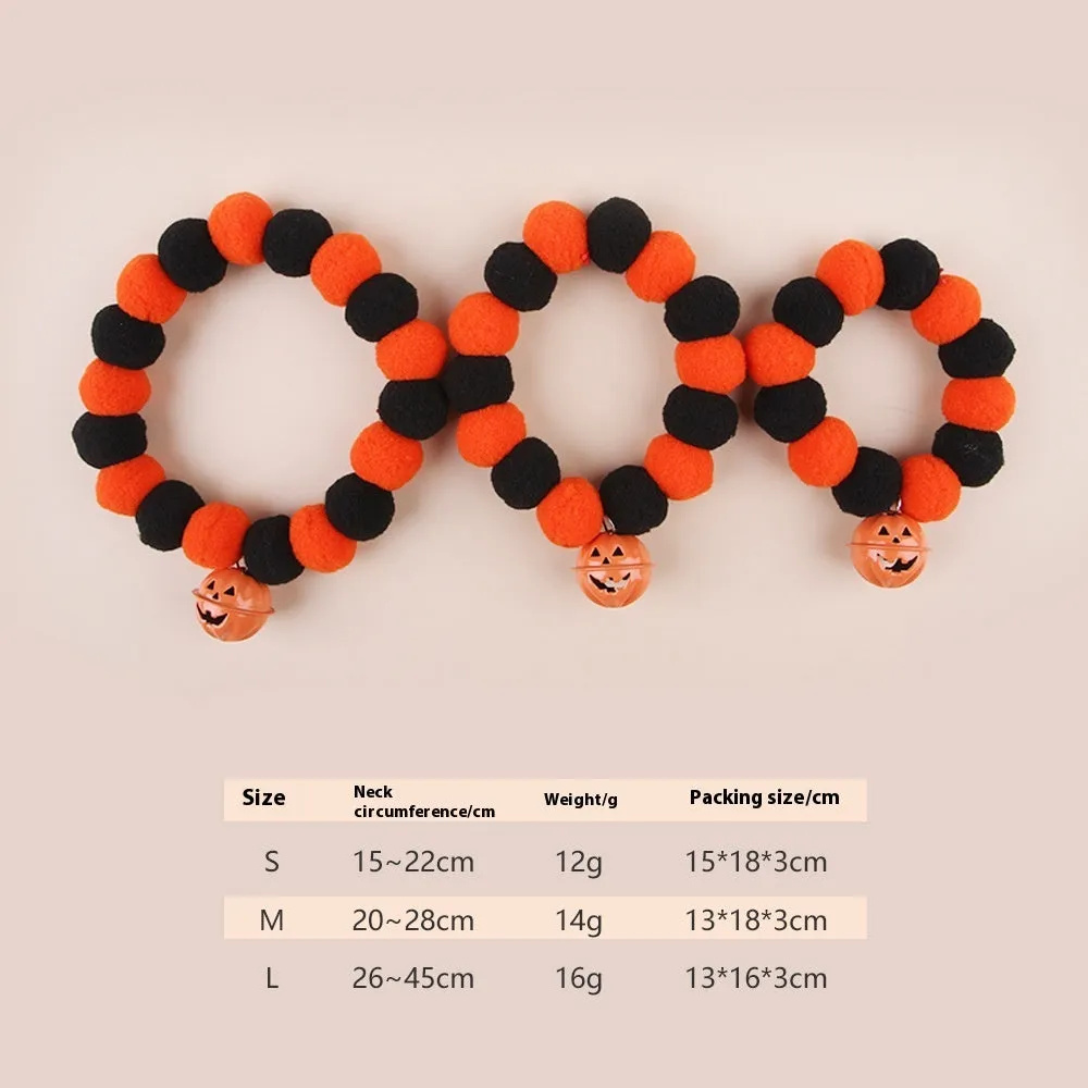 Naughty cat collar with pumpkin trick or treat design and bell ball in Halloween style