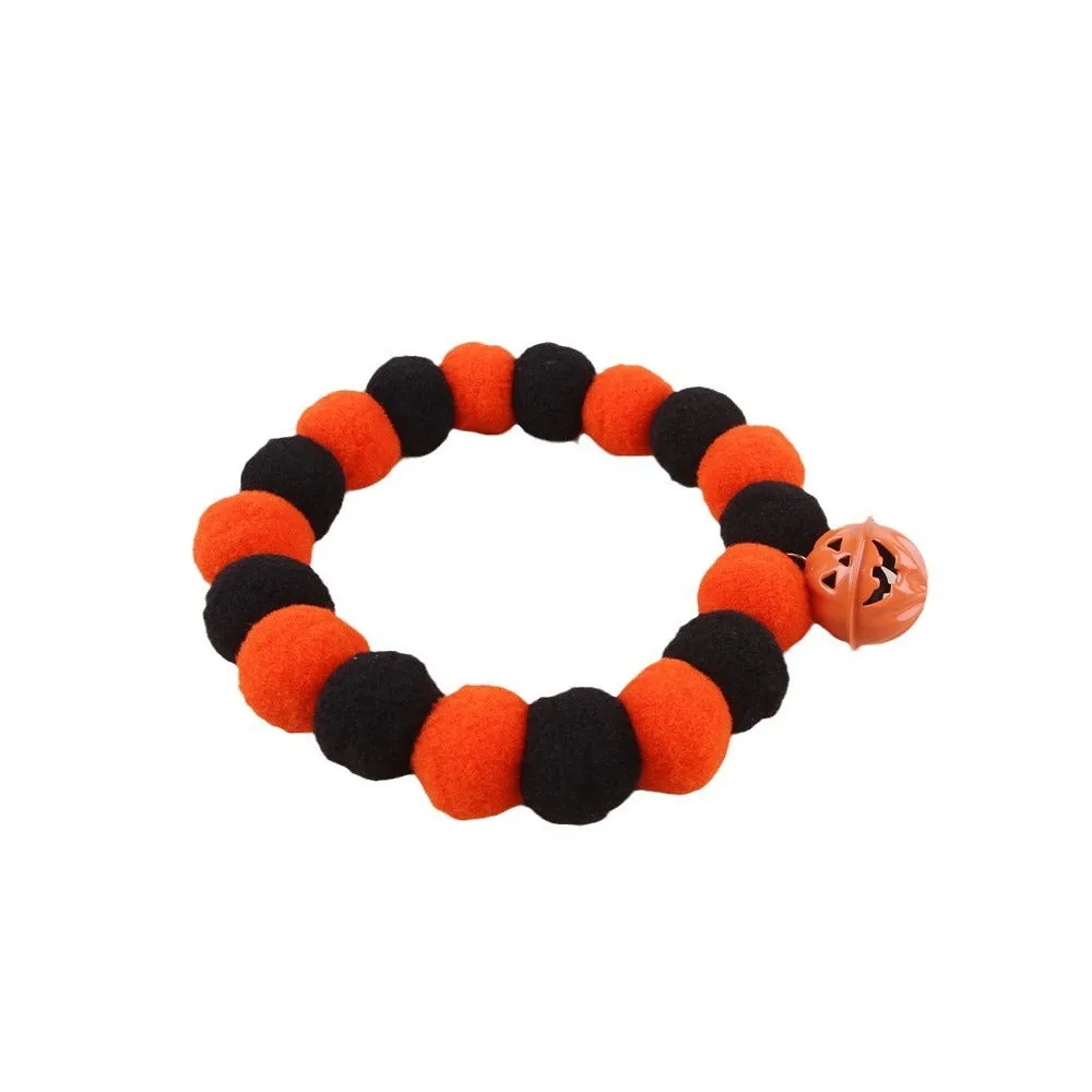 Naughty cat collar with pumpkin trick or treat design and bell ball in Halloween style