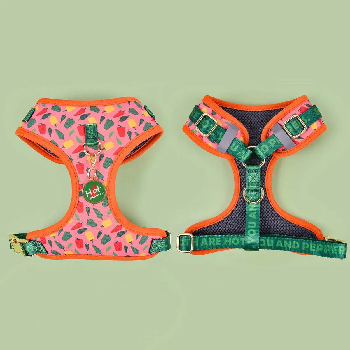 Adjustable polyester dog breast strap harness in Pink Avocado colour on a wooden surface