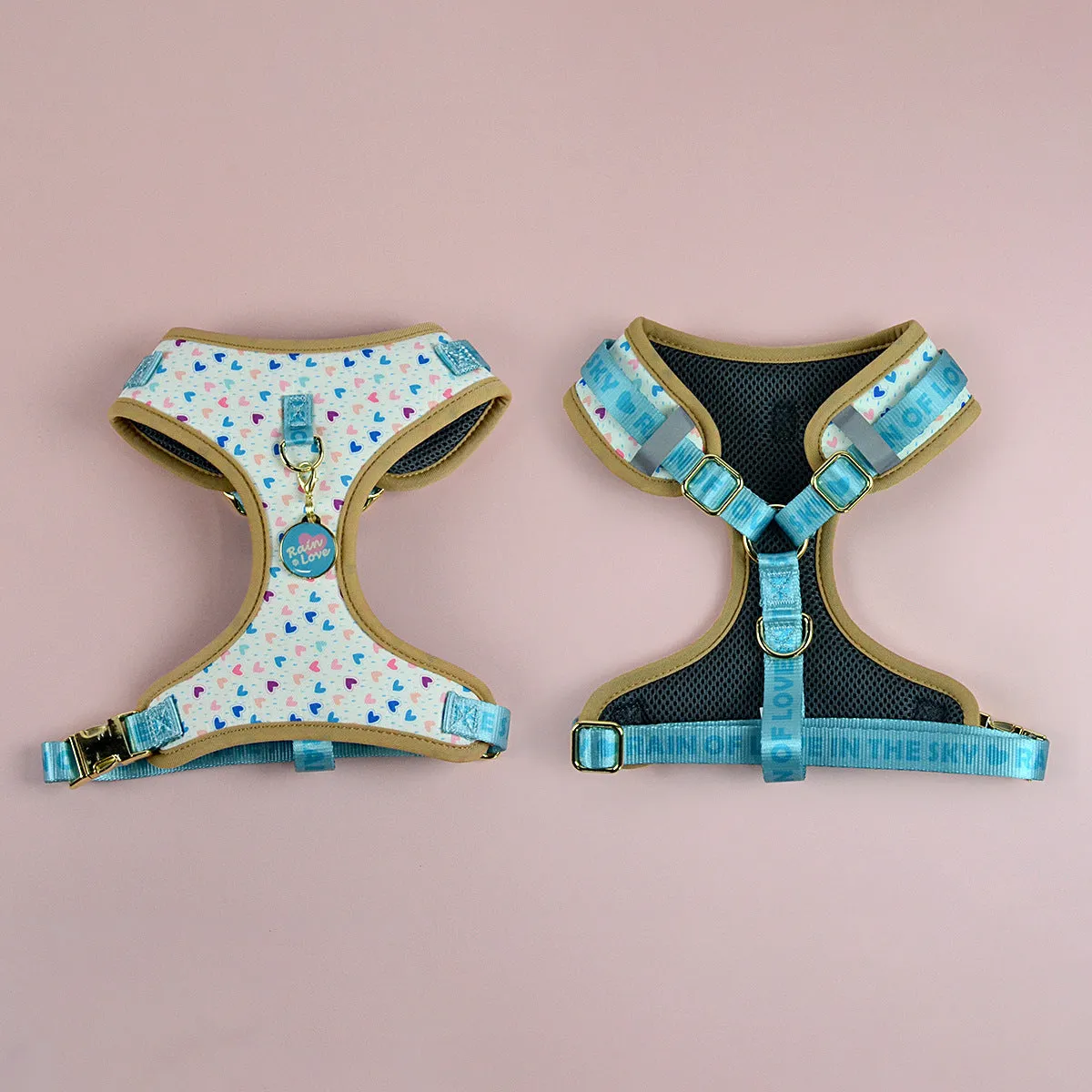 Adjustable polyester dog breast strap harness in Pink Avocado colour on a wooden surface