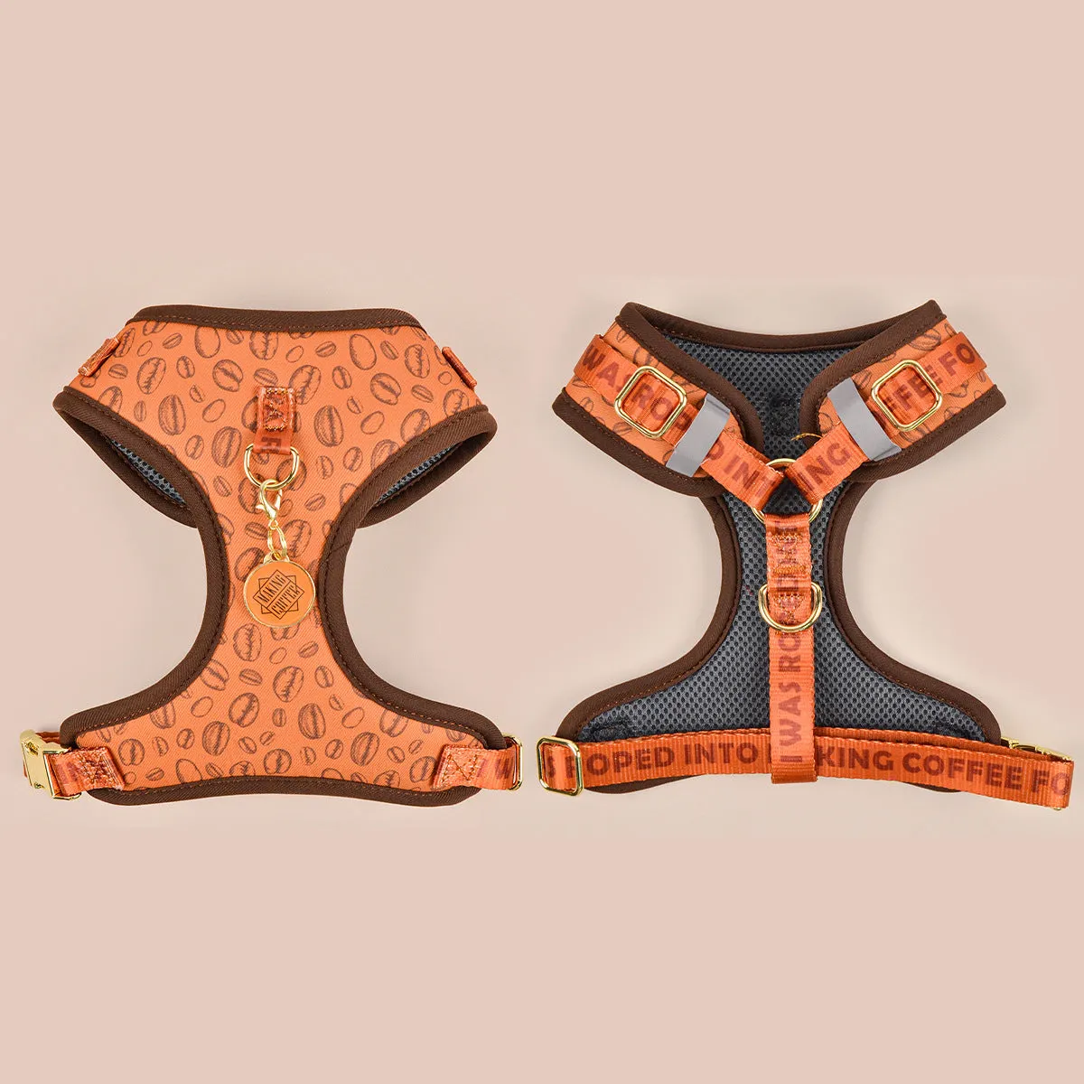 Adjustable polyester dog breast strap harness in Pink Avocado colour on a wooden surface