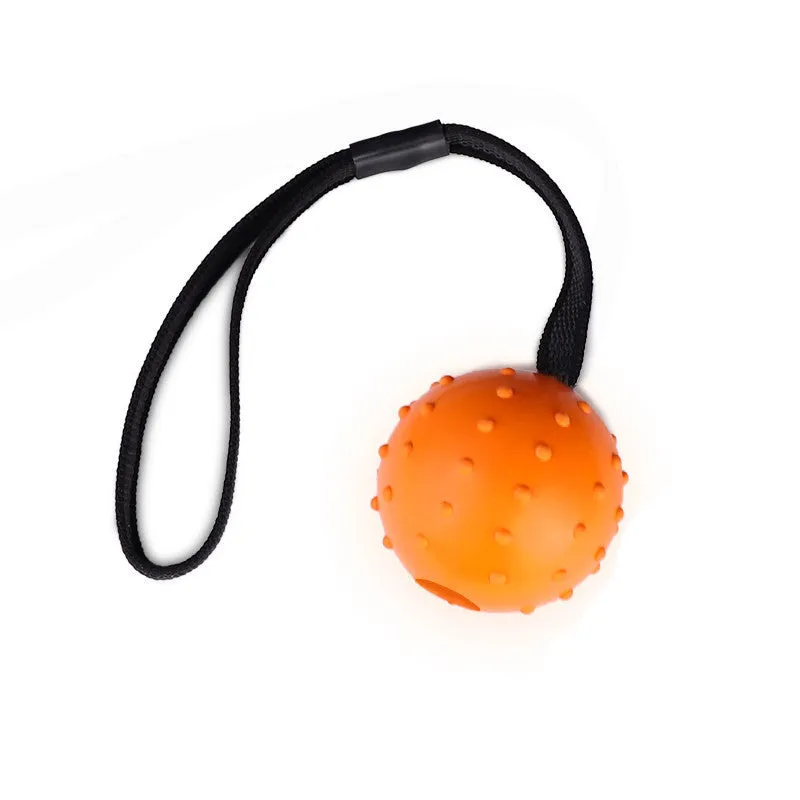 Dog training bite resistant rubber ball with rope in orange, size 6x30cm for medium dogs