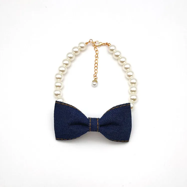 Pet necklace with denim bow and pearl pendant on a metal chain for cats and dogs in princess-style bib