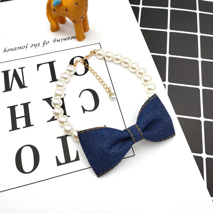 Pet necklace with denim bow and pearl pendant on a metal chain for cats and dogs in princess-style bib