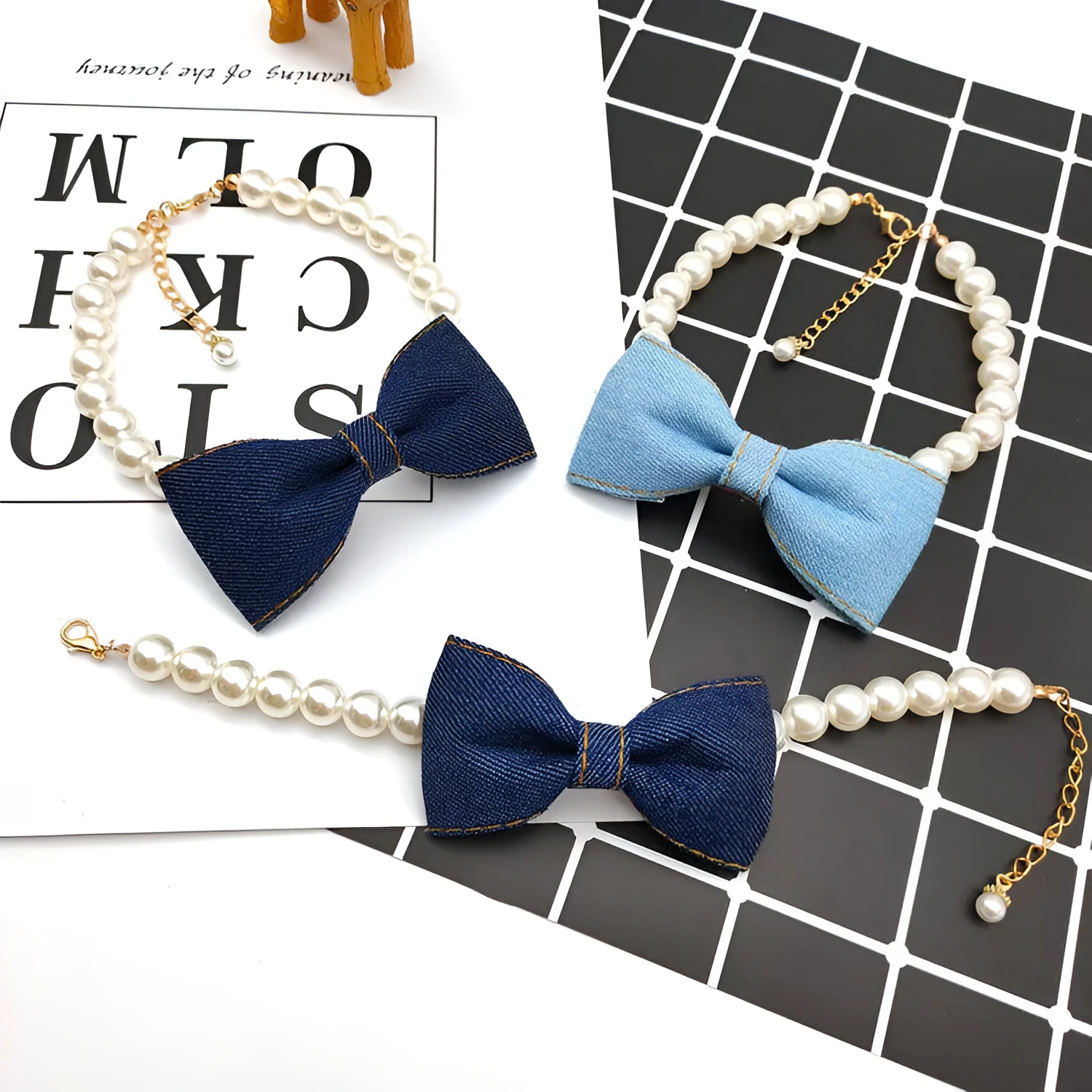 Pet necklace with denim bow and pearl pendant on a metal chain for cats and dogs in princess-style bib