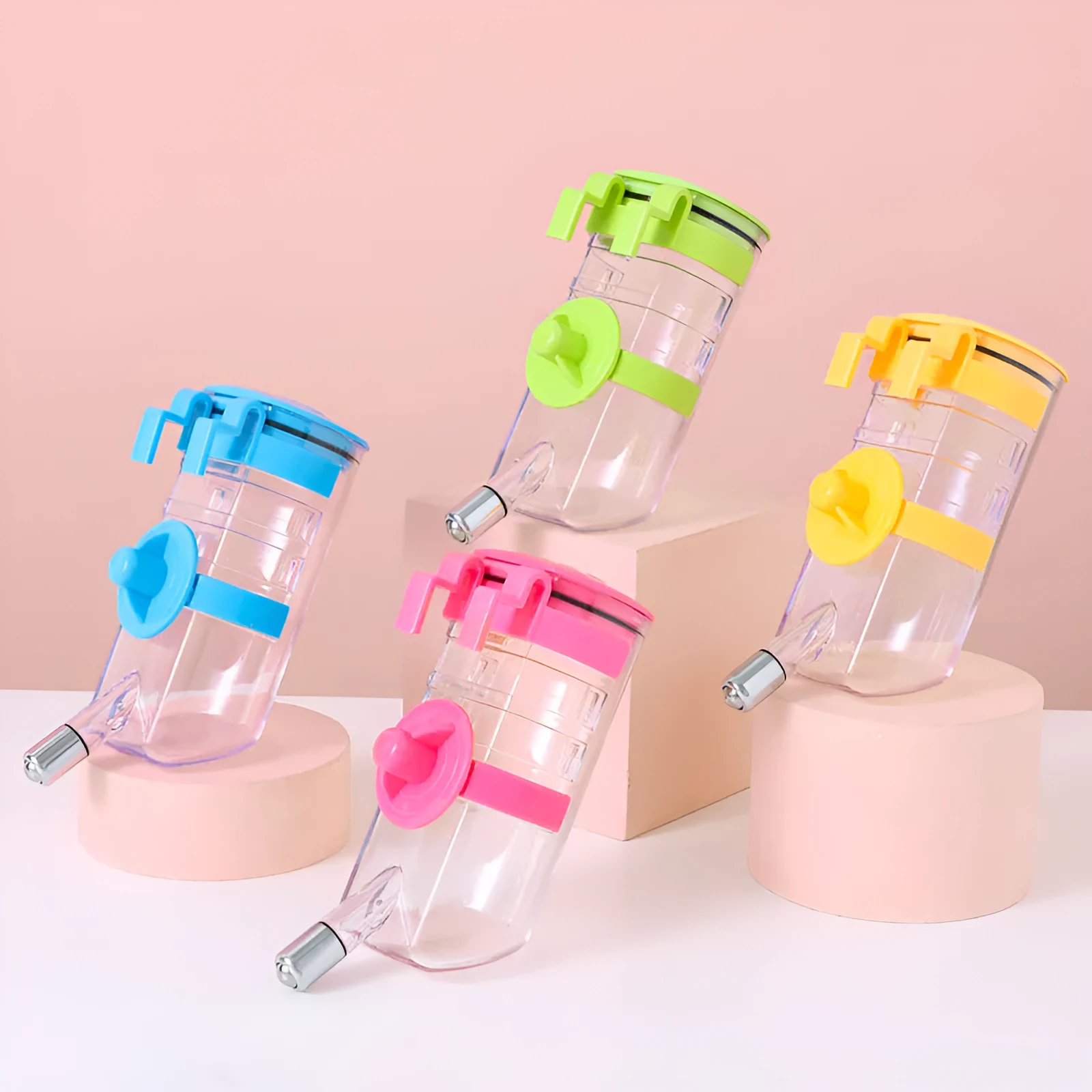 No drip dog kennel water bottle dispenser with dripless nozzle, hanging in a crate, available in blue, green, pink, and yellow