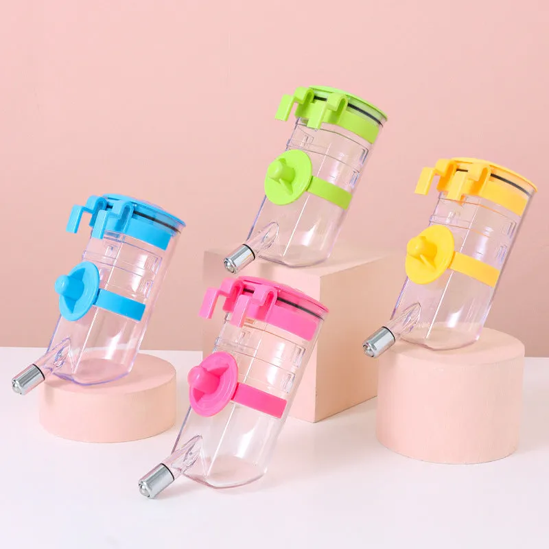 No drip dog kennel water bottle dispenser with dripless nozzle, hanging in a crate, available in blue, green, pink, and yellow
