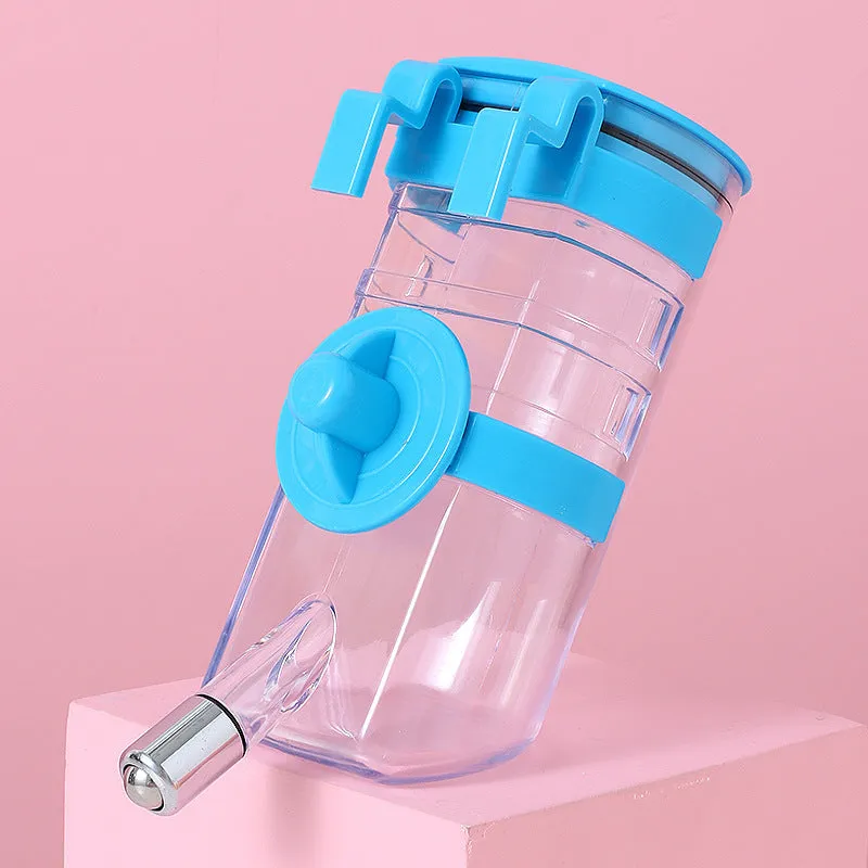 No drip dog kennel water bottle dispenser with dripless nozzle, hanging in a crate, available in blue, green, pink, and yellow