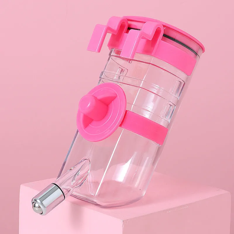 No drip dog kennel water bottle dispenser with dripless nozzle, hanging in a crate, available in blue, green, pink, and yellow