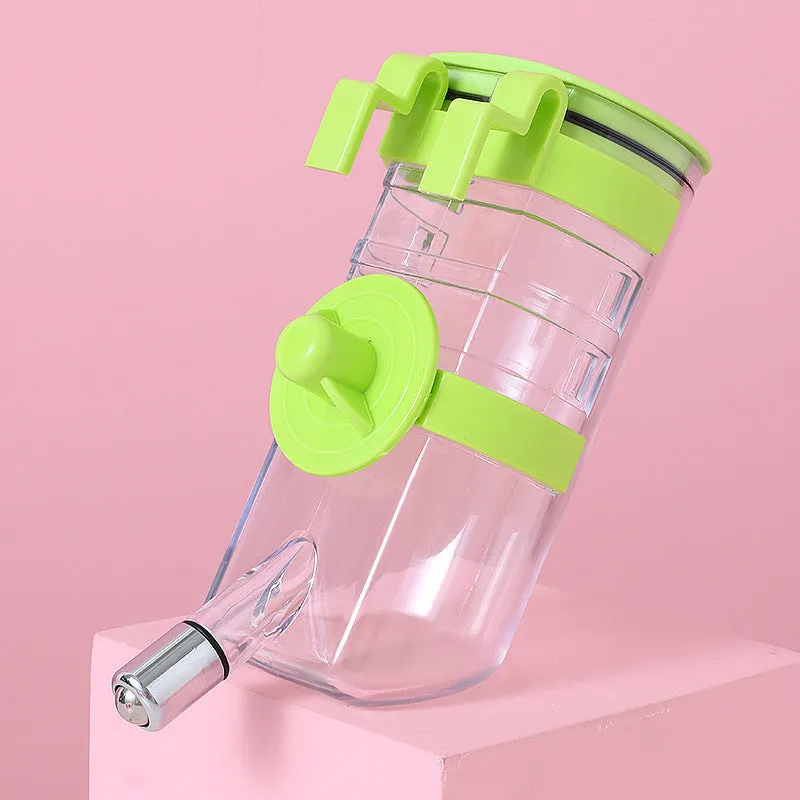 No drip dog kennel water bottle dispenser with dripless nozzle, hanging in a crate, available in blue, green, pink, and yellow