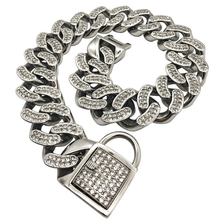 Adjustable stainless steel dog collar with diamond buckle in gold finish on white background