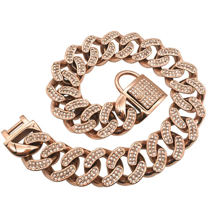 Adjustable stainless steel dog collar with diamond buckle in gold finish on white background