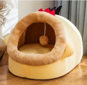 Washable pet kennel bed in brown leopard pattern, size M, on a wooden floor, showing non-slip bottom and removable cover.