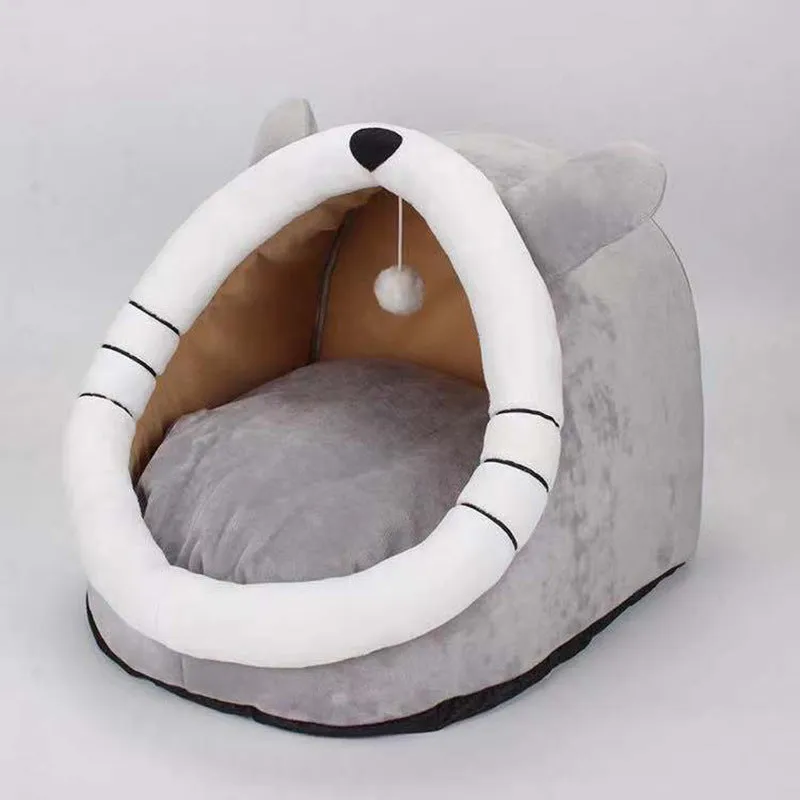 Washable pet kennel bed in brown leopard pattern, size M, on a wooden floor, showing non-slip bottom and removable cover.