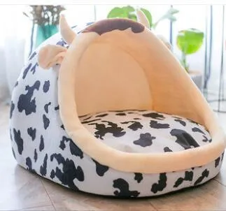 Washable pet kennel bed in brown leopard pattern, size M, on a wooden floor, showing non-slip bottom and removable cover.