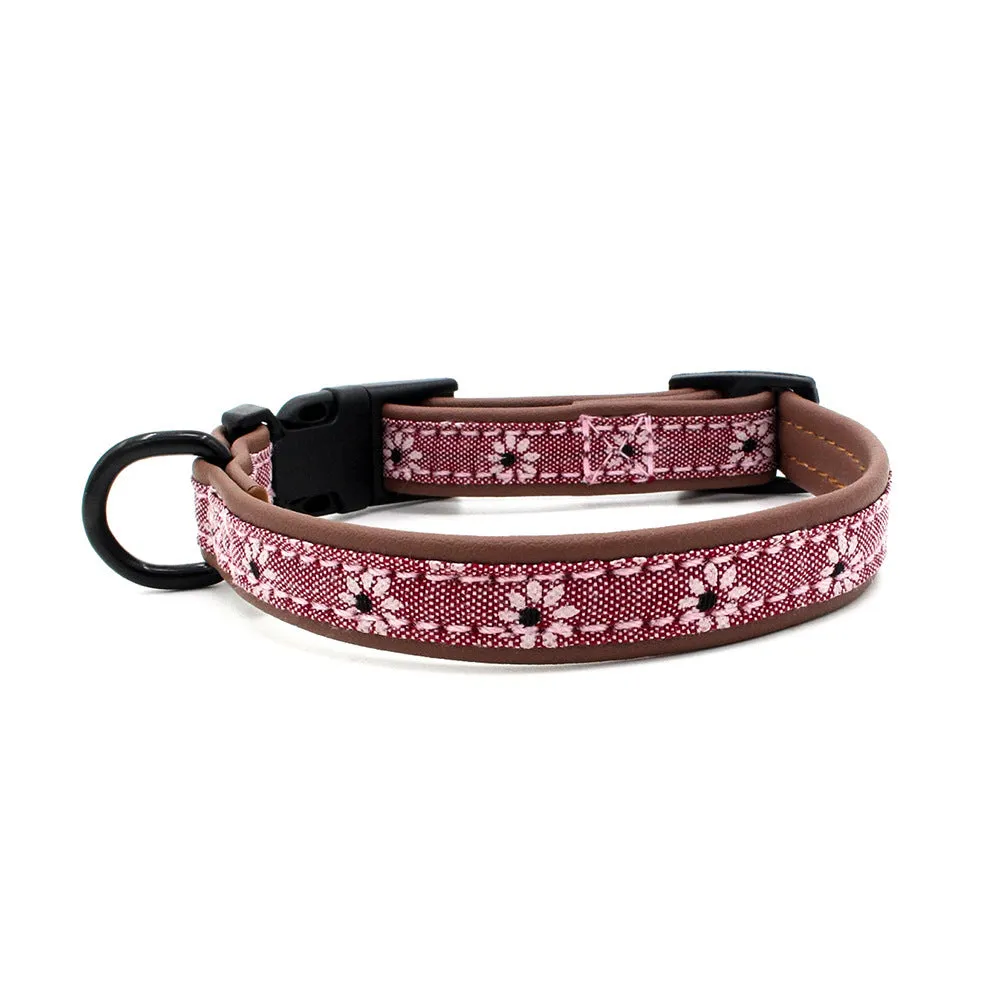 Plastic buckle dog collar in light blue with adjustable nylon webbing on white background