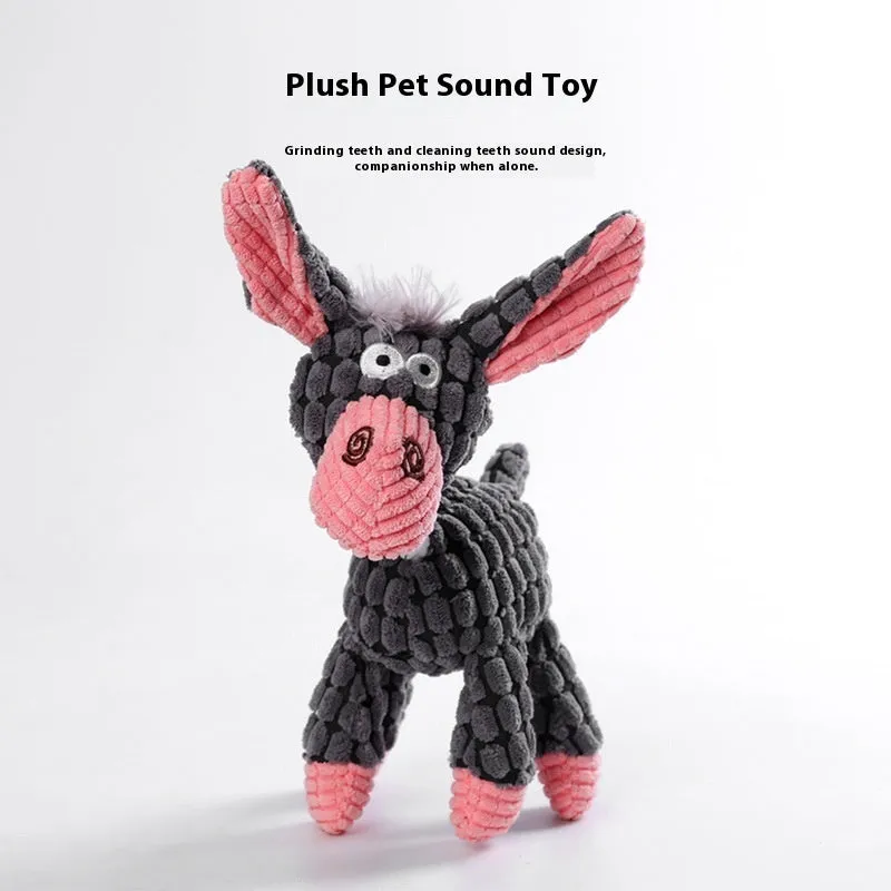Assorted plush dog toys including a pink-gray donkey, a beige donkey, a blue elephant, and yellow ducks in three sizes.