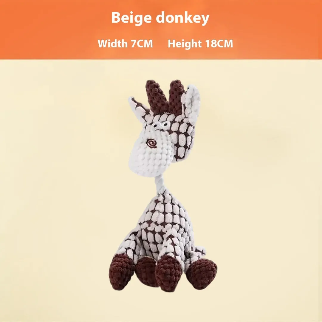 Assorted plush dog toys including a pink-gray donkey, a beige donkey, a blue elephant, and yellow ducks in three sizes.
