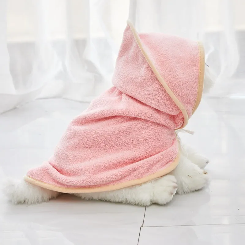 Microfiber pet quick-drying bathrobe in beige, folded on surface