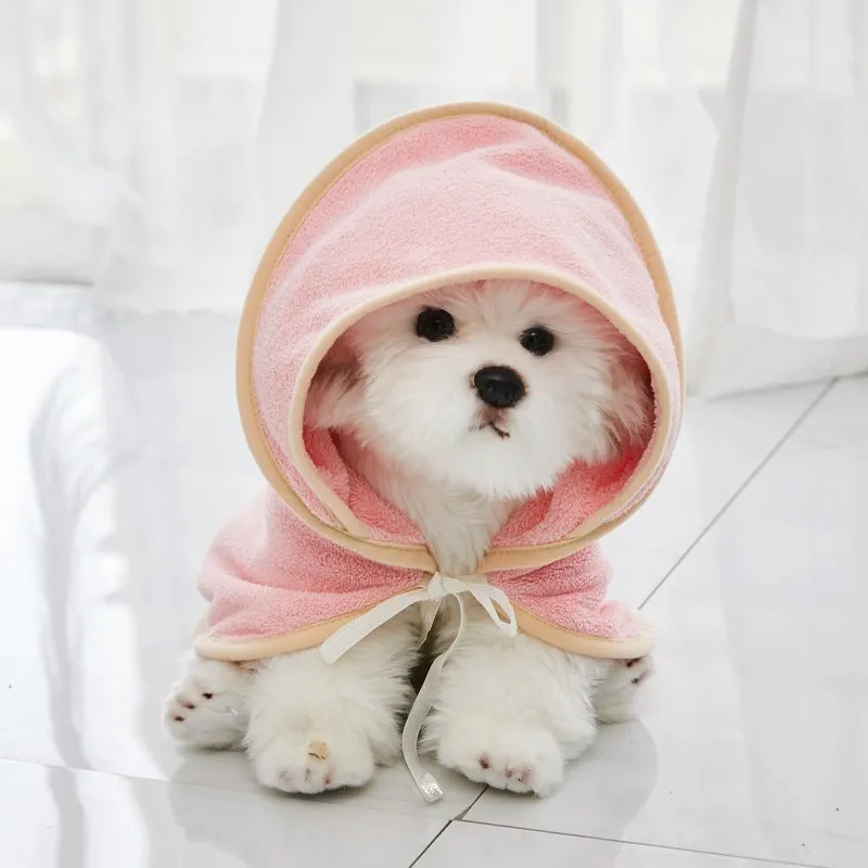 Microfiber pet quick-drying bathrobe in beige, folded on surface