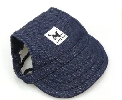 Dog wearing a baseball-style sun hat made of 63% cotton and 37% Terylene in a casual outdoor setting
